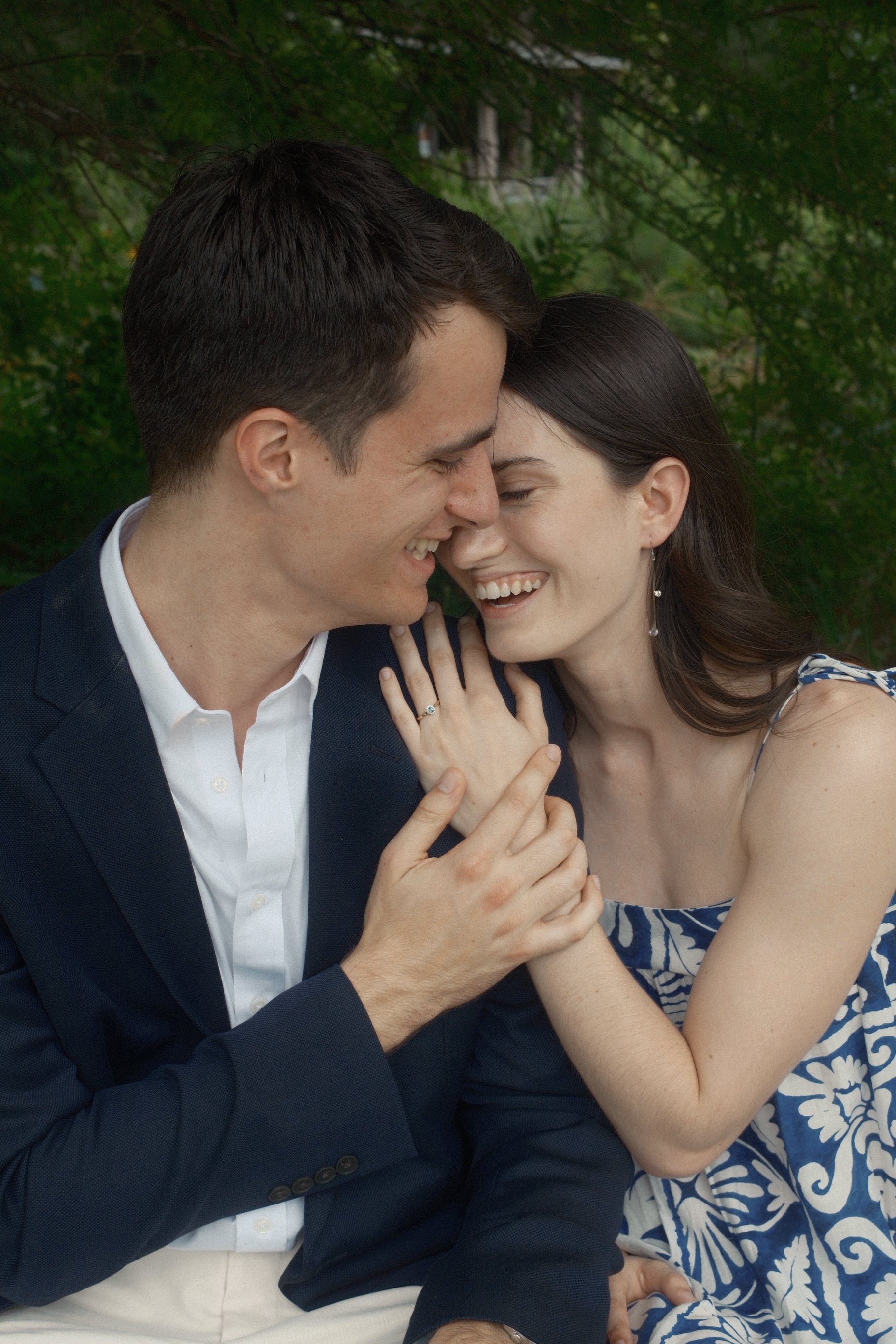 Sophie and David embracing after their engagement
