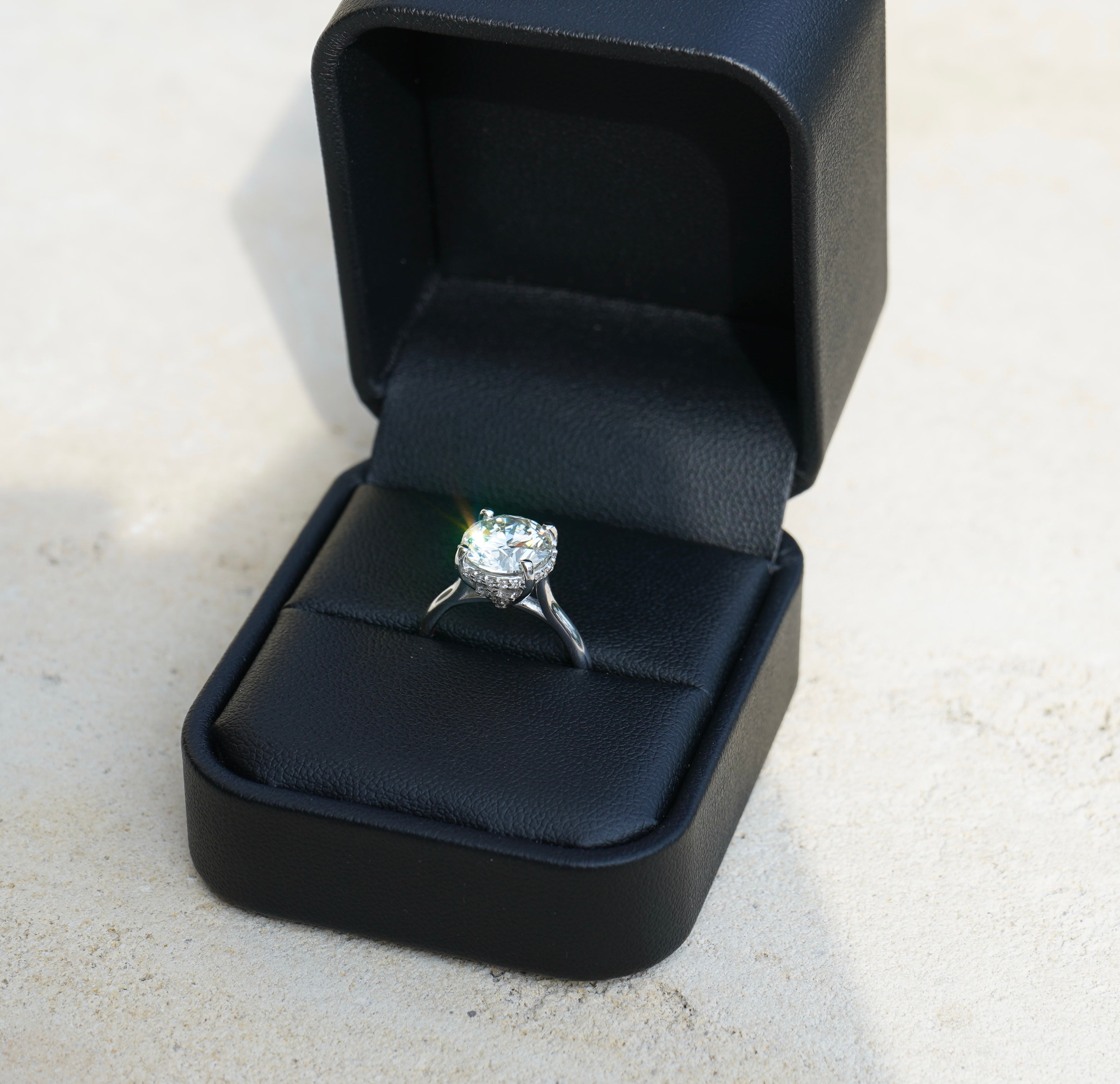 Finished custom engagement ring presented in its box